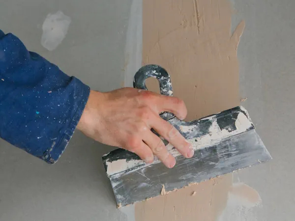 Interior wall cracks near door frame in a Burleson TX home indicating foundation movement requiring crack repair
