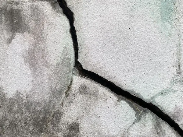 Professional foundation crack repair in Burleson TX using epoxy injection to seal and reinforce a structural crack